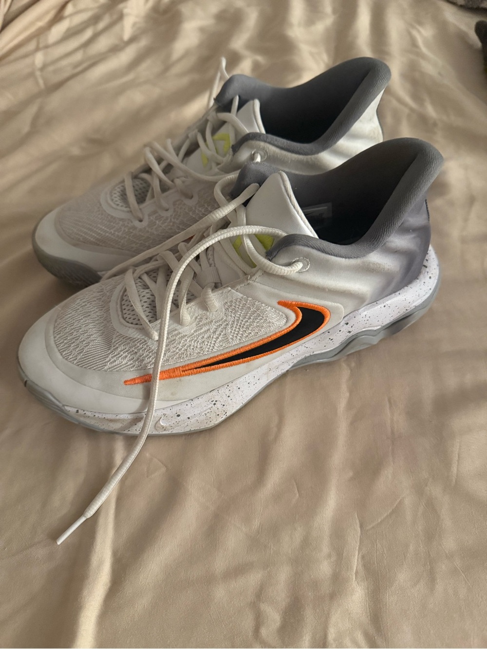 Nike Kids White Sneakers with Orange and Black Swoosh and Gray Collar